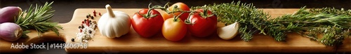 Overhead view of authentic Italian produce display featuring seasonal vegetables and fresh herbs on weathered wood surface with soft natural illumination