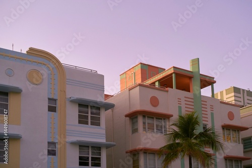 Colorful art deco architecture reflects sunset hues