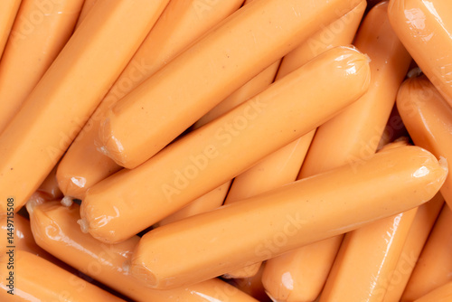 Heap of chicken vienna sausage wrapped in plastic. Close up