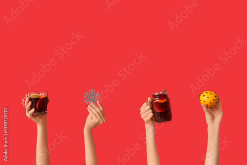 Female hands holding orange...