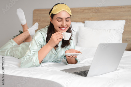 Young woman in green pajama...
