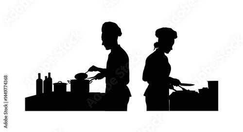 Silhouette of Two Chefs Cooking in a Kitchen