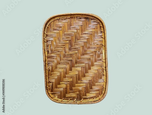 The light green background in the picture is a pattern of brown rattan and bamboo weaving. It is a beautiful and delicate weaving pattern that can be used to weave baskets or various products.