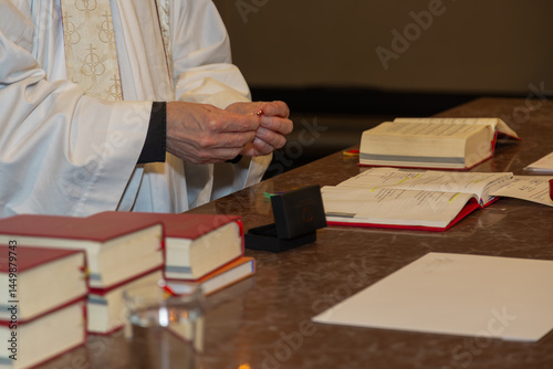 The hands priest with ring