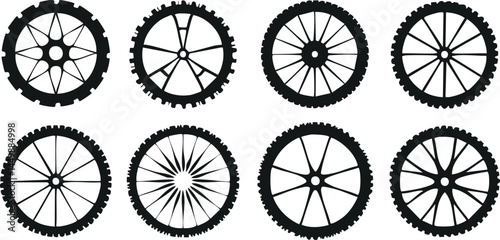 Vector Set of Bicycle Wheel Silhouettes Featuring Multiple Spoke Designs, Tire Treads, and Hub Configurations in a Black and White Minimalist Style

