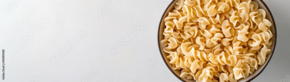 Rotini Pasta in Bowl on White Surface, Italian ,Foodie Rotini Pasta in Bowl on White Surface, Italian ,Foodie