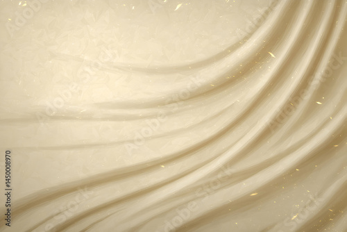 Soft flowing fabric creates a serene atmosphere with gentle movement and warm tones of gold in an artistic composition