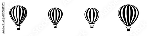 Hot air balloons floating gracefully in the clear sky during a sunny day at the summer festival