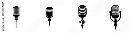 Vintage microphones displayed in a row, showcasing different styles and designs from various eras in sound recording technology