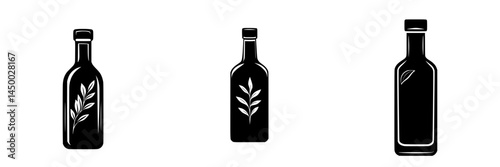 Artistic arrangement of three black and white bottles with leaf motifs on a plain background