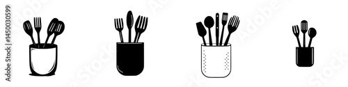 Various kitchen utensils arranged in containers for organized cooking preparation in a modern kitchen space