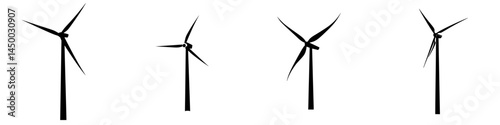 Four wind turbines spinning against a clear sky, showcasing renewable energy generation in an open landscape at sunset