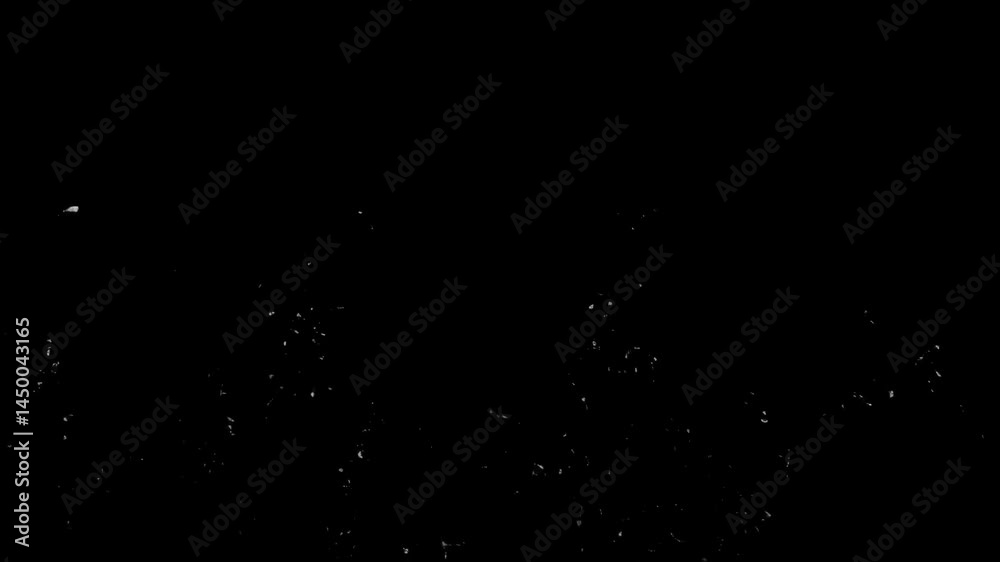 Dramatic shot of white liquid splashing against a dark background, showcasing dynamic movement and abstract forms of fluid dynamics