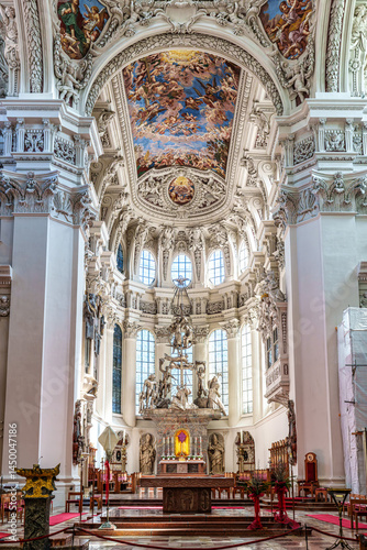 Interior of St. Stephans cathedral in Passau, Germany is an old white church with famous organ pipes