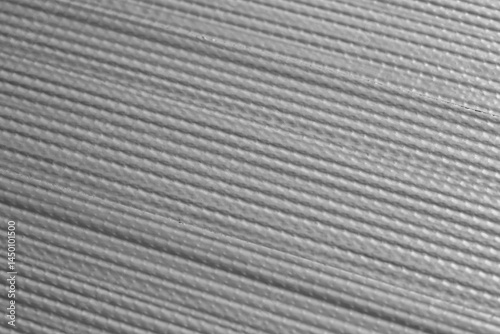 Close-up of strips of grey duct tape, or gaffer tape, background. Strong waterproof industrial tape concept