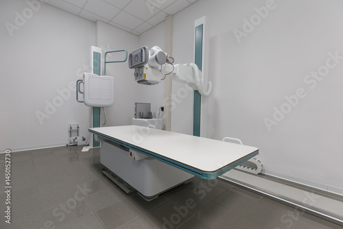 Computerized diagnostic tools in a white room, no people are visible.