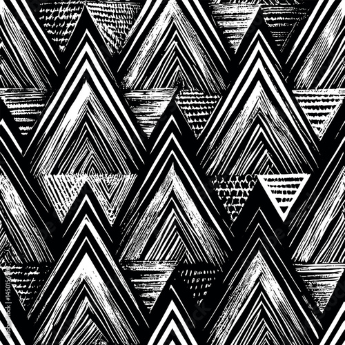 Pattern of black and white geometric triangles arranged in a striking design suitable for modern textiles and wallpapers Generative AI