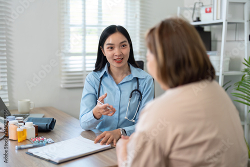 Consultation and Health Communication. A general practitioner engaging in a detailed discussion with a patient.