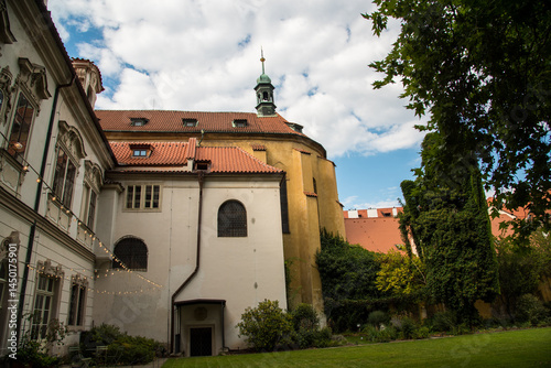 Historic building with tower at the forest’s edge