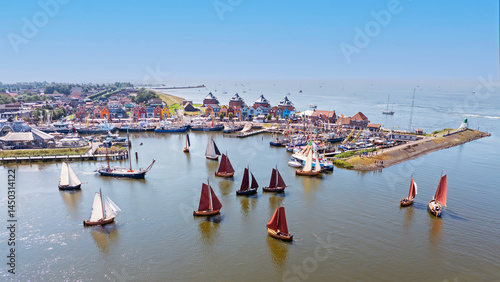 Aerial from traditional wooden ships in the harbor from Stavoren in Friesland the Netherlands