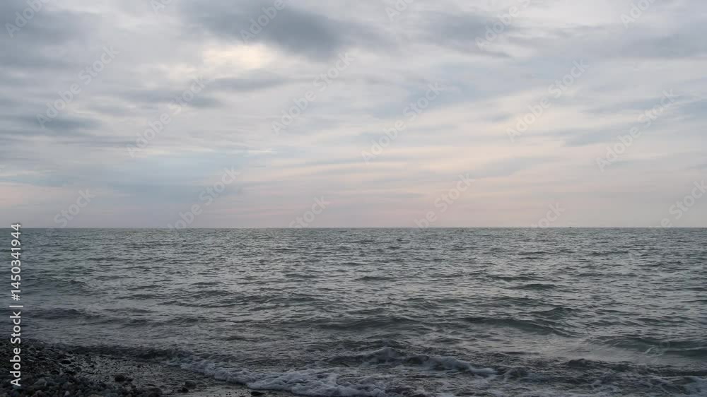Сlouds over the sea. Cloudy sky and waves on the Black Sea Сlouds over the sea. Cloudy sky and waves on the Black Sea