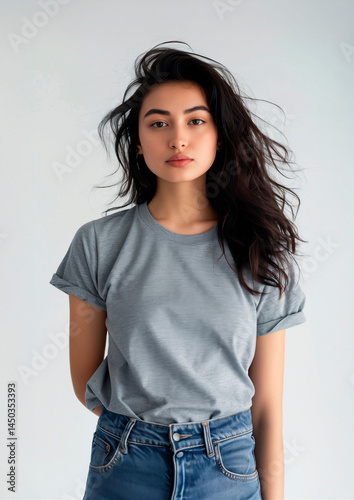 Minimal Grey T-Shirt Mockup on Woman for Branding and Design Presentation. On a white background. AI-generated photo