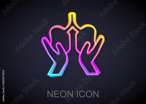 Glowing neon line Lungs icon isolated on black background. Vector