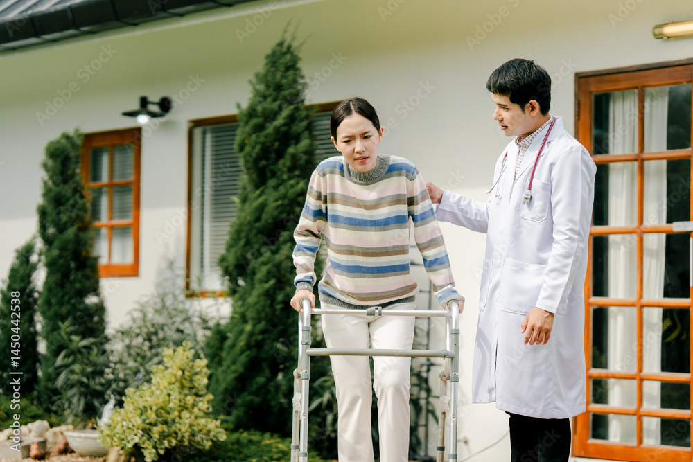 Fototapeta premium Personal physician who takes care of paraplegic and hemiplegic patients and provides support to them at home.