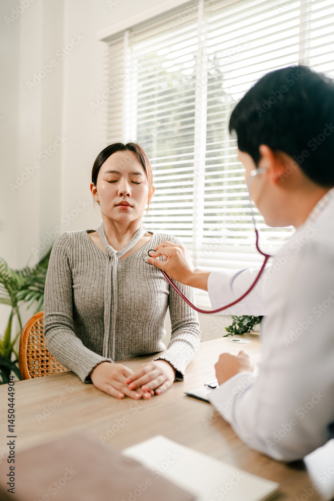 Female patient consulting with specialist at hospital, chest pain and cardiitis, heart disease care concept Female patient consulting with specialist at hospital, chest pain and cardiitis, heart disease care concept