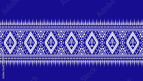 Motifs paisley embroidery on blue background Geometric Ethnic traditional seamless, oriental pattern, Aztec,Tribal, Hmong, Native Amarican Indian, Pattern design for texture, fabric, clothing,wrap,