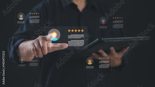 business professional confidently uses a tablet device to give a 5-star rating, expressing satisfaction and appreciation for the exceptional services recently the value of quality service business..