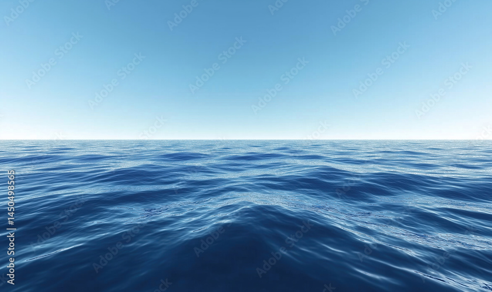 Fototapeta premium calm ocean surface with gentle waves under clear blue sky.