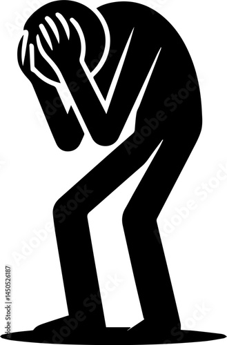 Person crouching with head down, appearing sad or depressed
