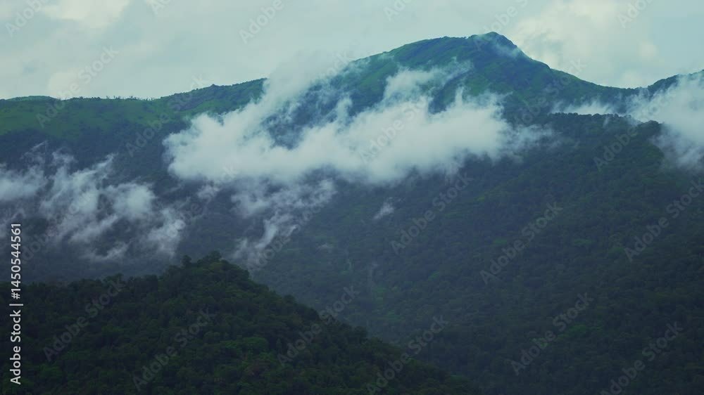 Monsoon Clouds Rolling Over Mountain Peaks Monsoon Clouds Rolling Over Mountain Peaks