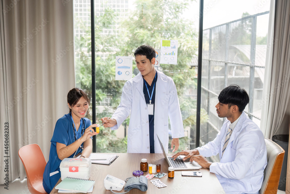 Doctor sharing medication details with a nurse in a meeting Doctor sharing medication details with a nurse in a meeting