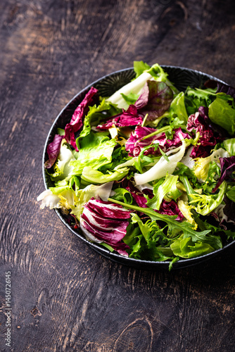 Bowl of fresh green salad mix