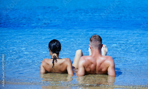 Sticker Couple in love enjoying romantic beach moment