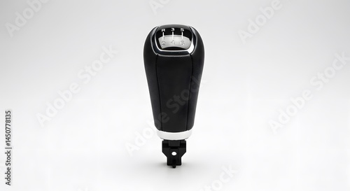 Leather Gear Shift Knob: A close-up view of a luxurious black leather gear shift knob with chrome accents, capturing the intricate detail and craftsmanship of this automotive component. 