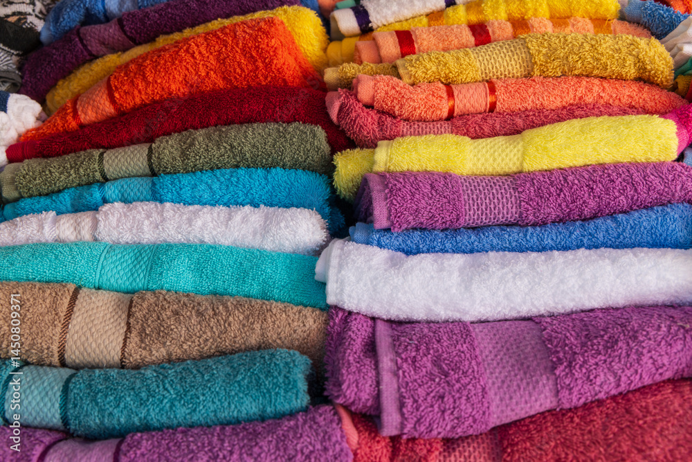 Colorful towels for sale at a shop in Tirana.