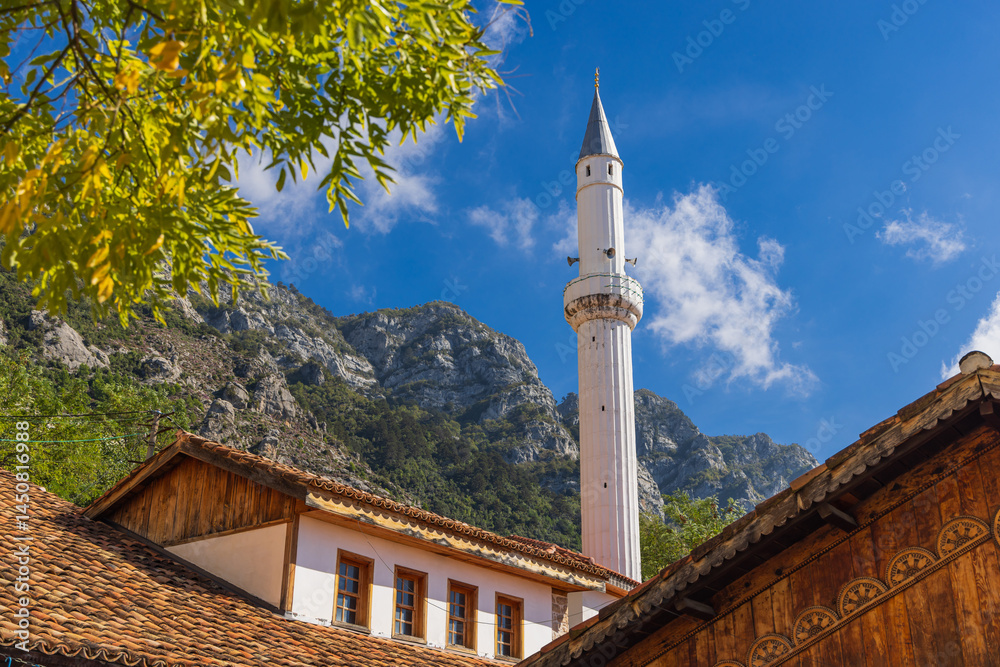 Minaret in front of mountains in the town of Kruje.
