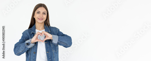 Positive healthy happy young woman show heart sign smiling, cherish relationship, express love care and delight, confess feelings for family, sympathy, stand white background