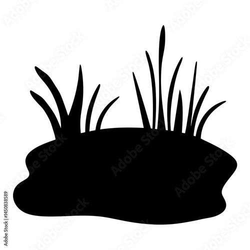 Black silhouette of a clump of grass growing on a mound