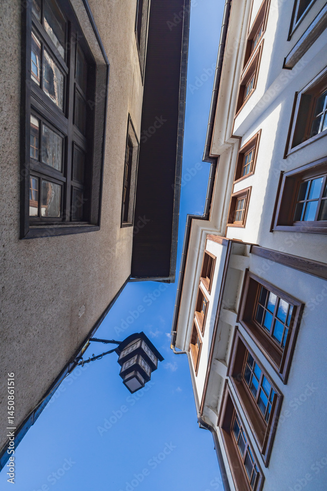 Looking up from a narrow alley and traditional buildings in Ohrid.