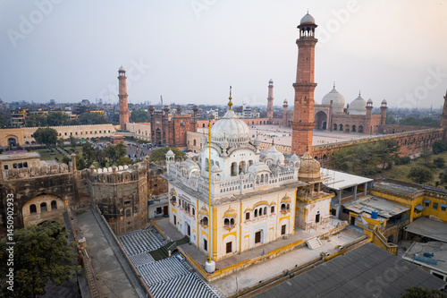 Aerial view of Lahore featuring Gurdwara Dera Sahib, Samadhi of Ranjit Singh, and Badshahi Mosque. photo