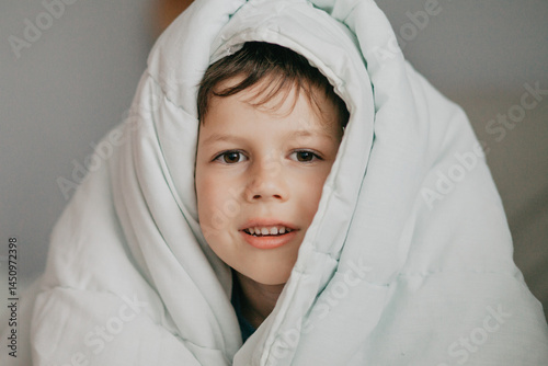 Cute Child under blanket