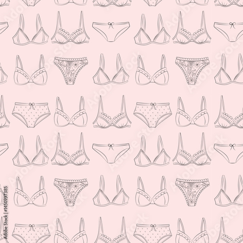 Seamless pattern with female underwear on a pink background.