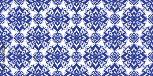 Abstract vector blue and white hand drawn seamless pattern with decorative geometric star shapes ethnic motif. Ornamental geometry print with striped octagons for textile design, optical illusion