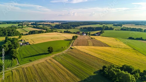 Aerial View of Lush Patchwork Farmland in the Rolling Countryside