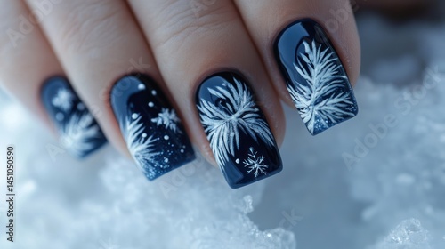 Elegant Winter Nail Art Design:  Navy Blue Nails with White Snowflake and Fir Branch Nail Polish photo