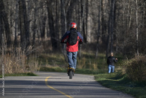 Wallpaper Mural A young man riding a bike, spring, Torontodigital.ca